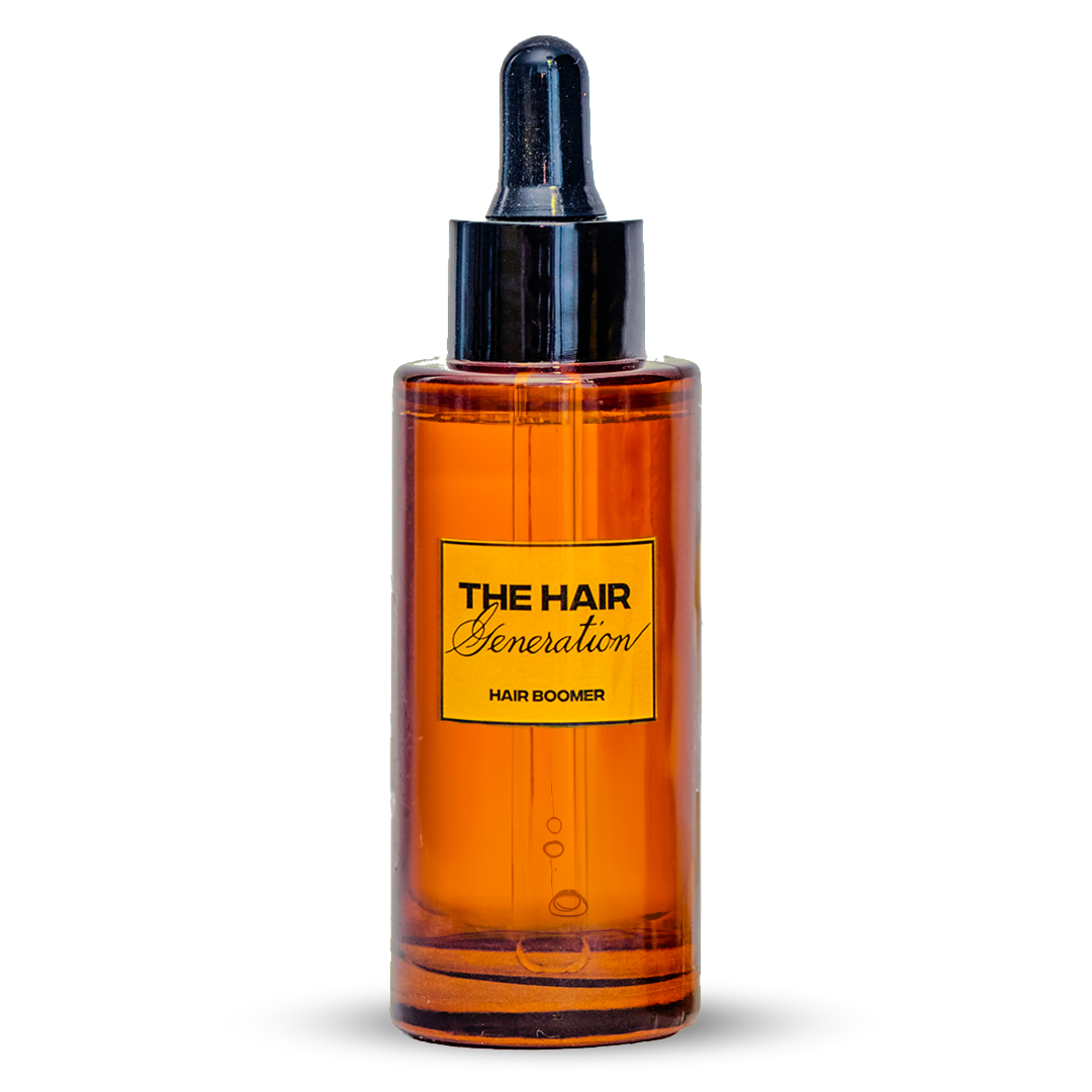 Amber glass bottle with black cap on a white background, featuring 'The Hair Generation' label.