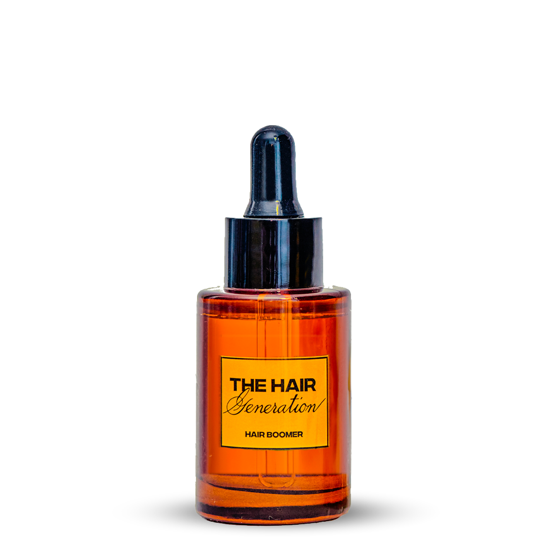 Orange bottle with black cap labeled 'The Hair Generation' on a white background